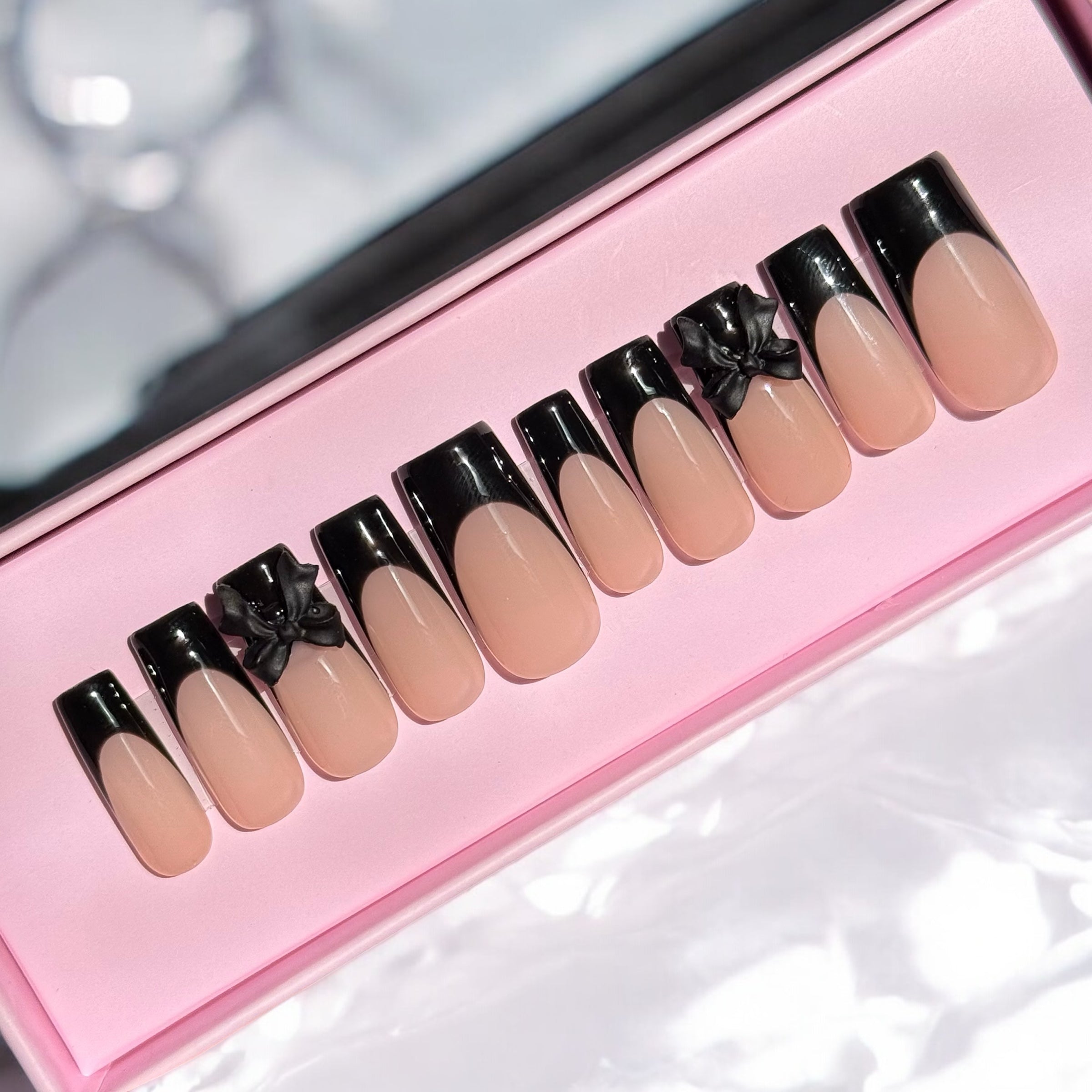 Medium square in black color and bow