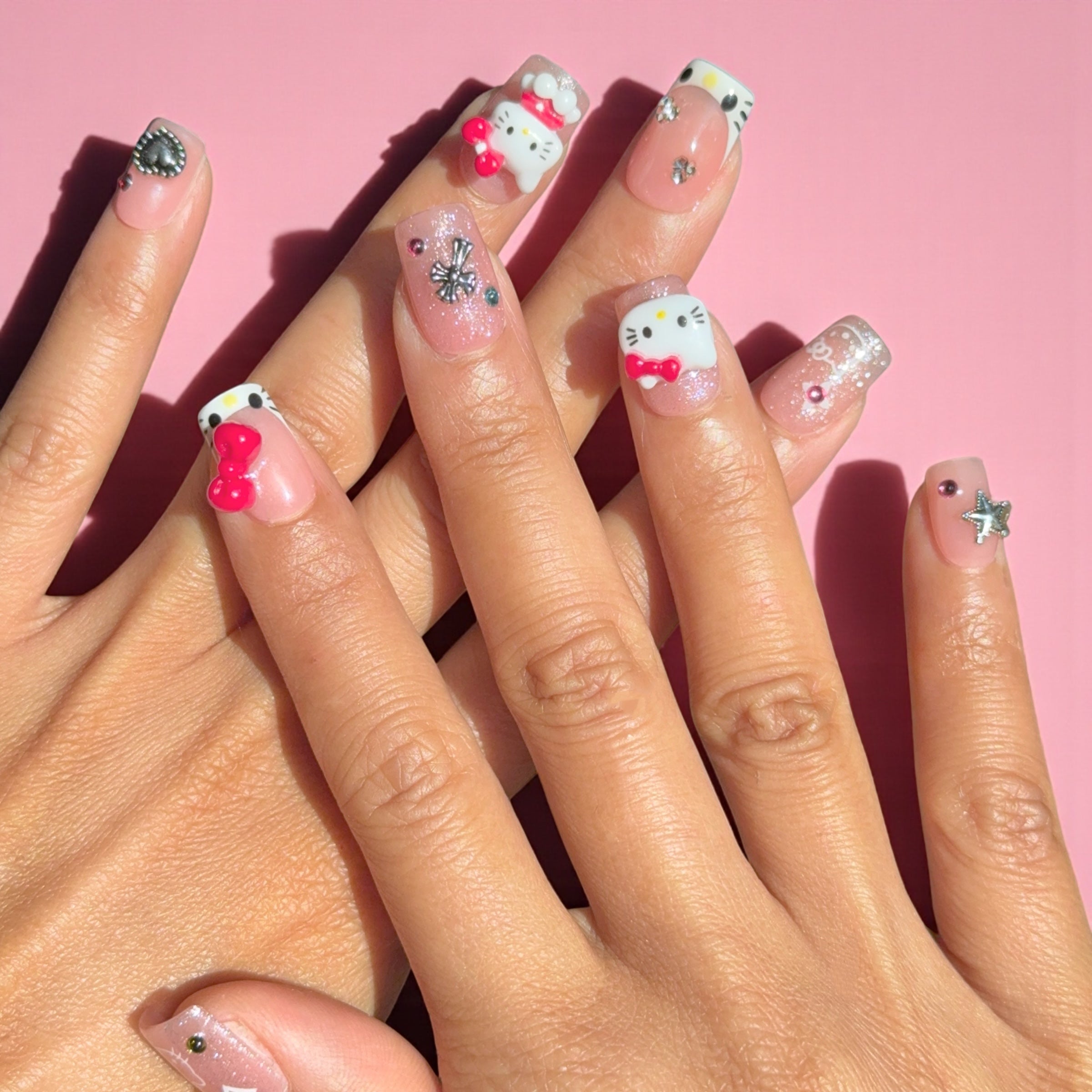 short red Hellokitty Nails