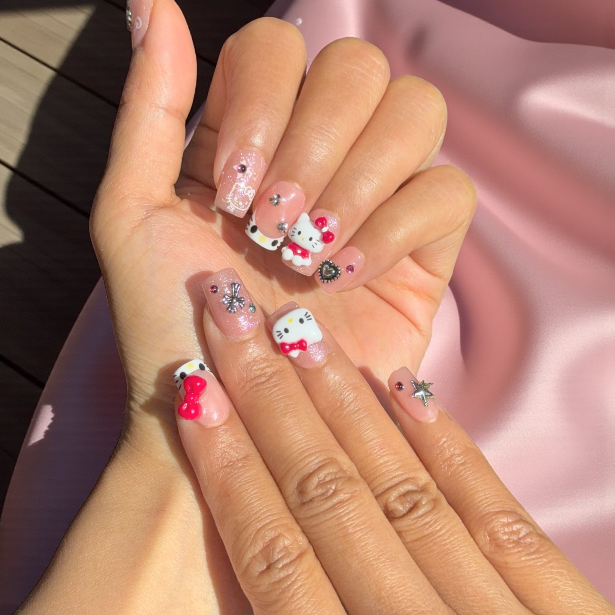 short red Hellokitty Nails